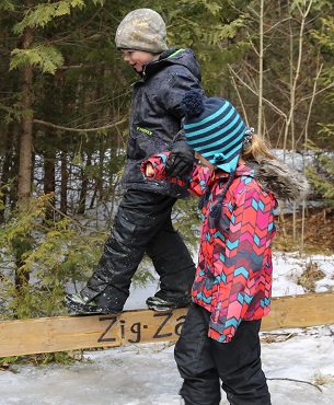 boy and girl practice balance exercise at Claremont Nature Center March Break camp